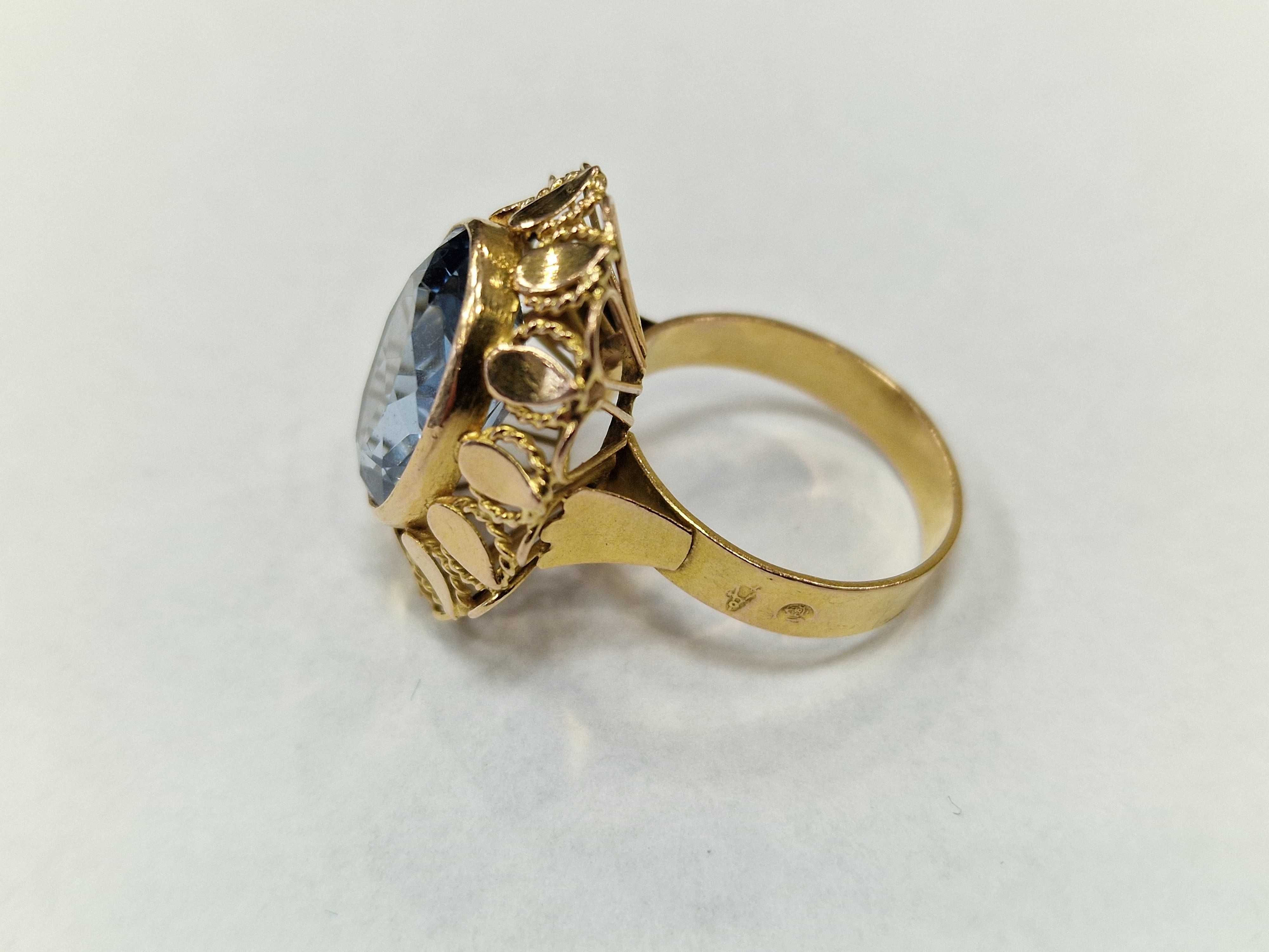 Złoty pierścionek/ ~~ 750/ 6.38 gram/ R15/ Topaz/ praca ręczna