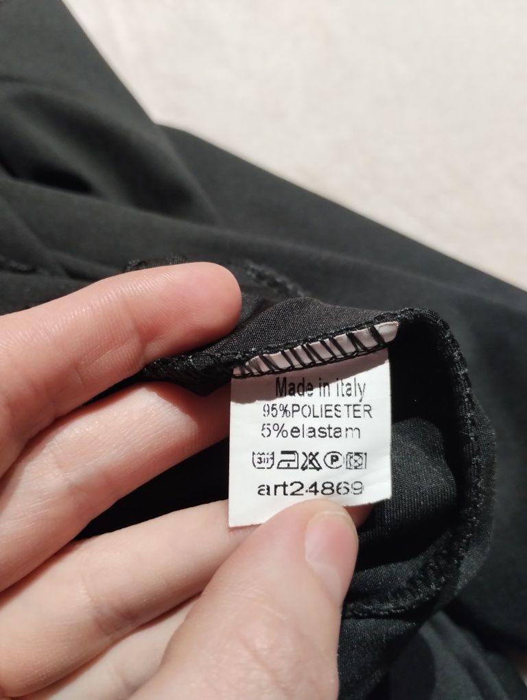 Czarny kombinezon lycra, zamek , złota naszywka ,uni ,