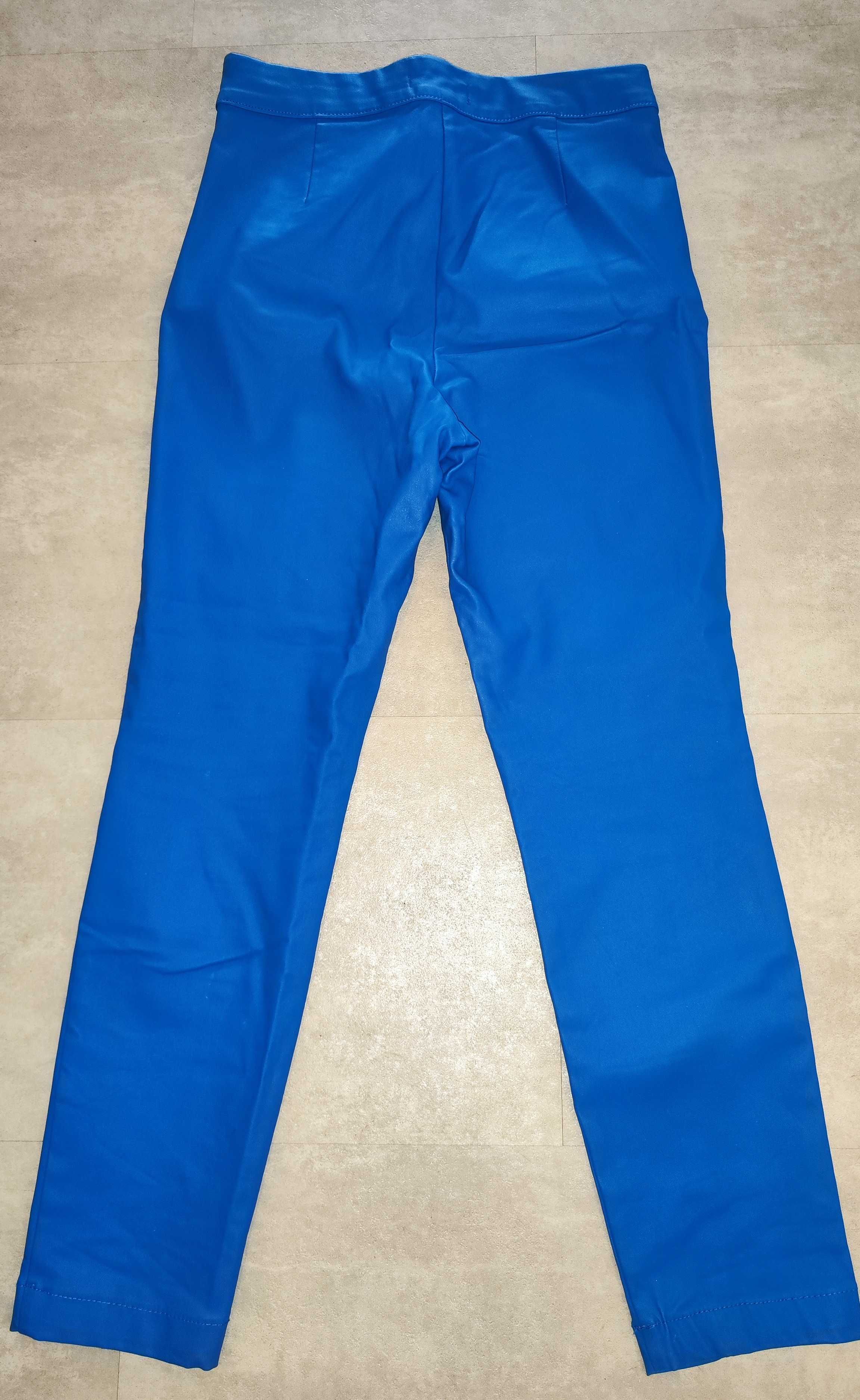 Niebieskie spodnie a'la skóra Reserved, roz. 40/42