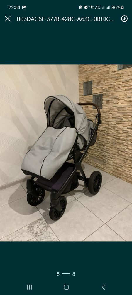 Коляска 3 в 1 сірого кольору