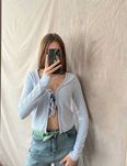 Топ на зав'язках ніжного кольору від Hollister