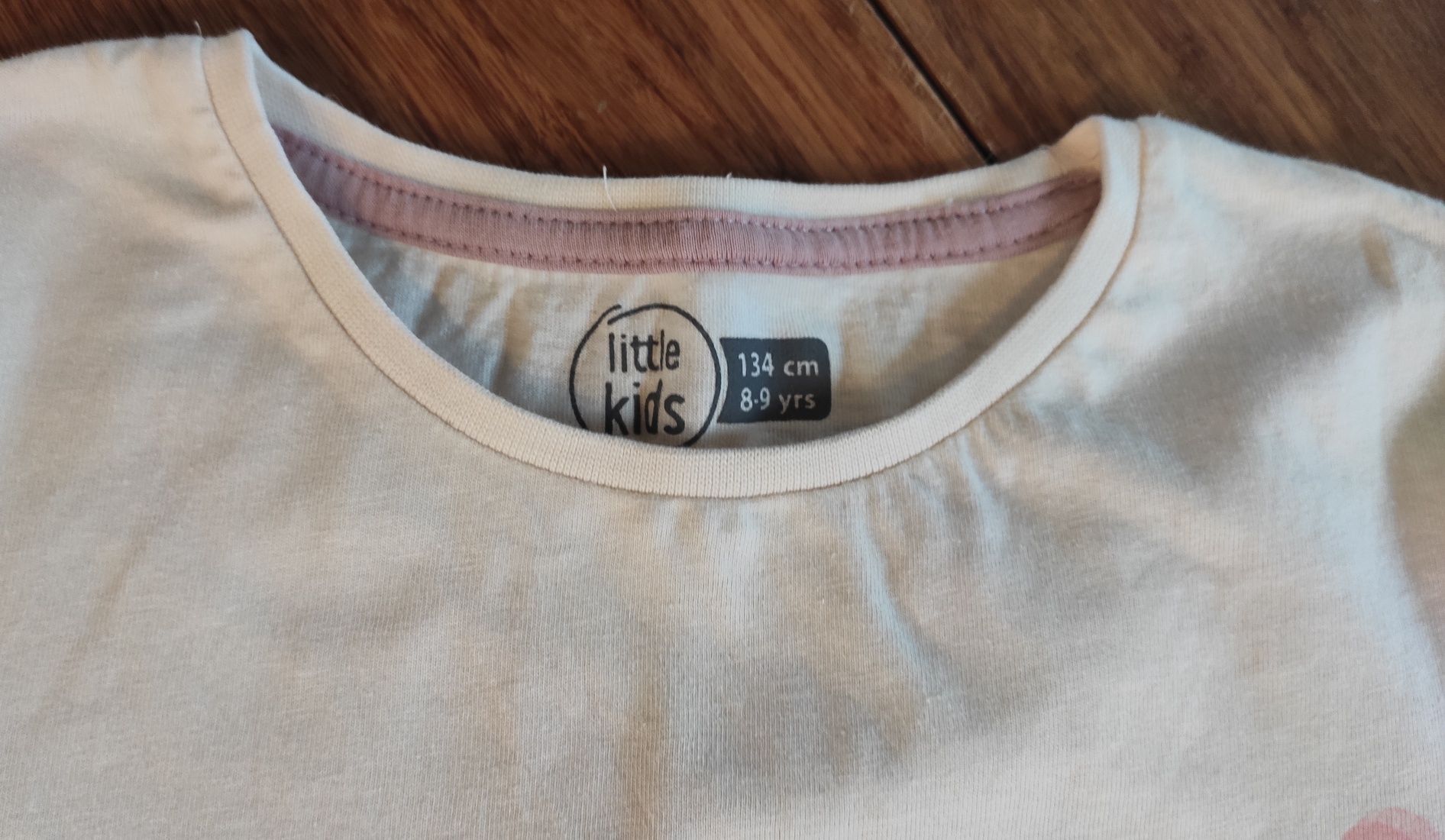 Koszulka bluzka z falbanką z długim rękawem rozmiar 134
