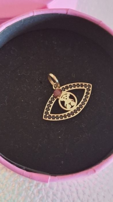 Olho protetor da TOUS com rubi