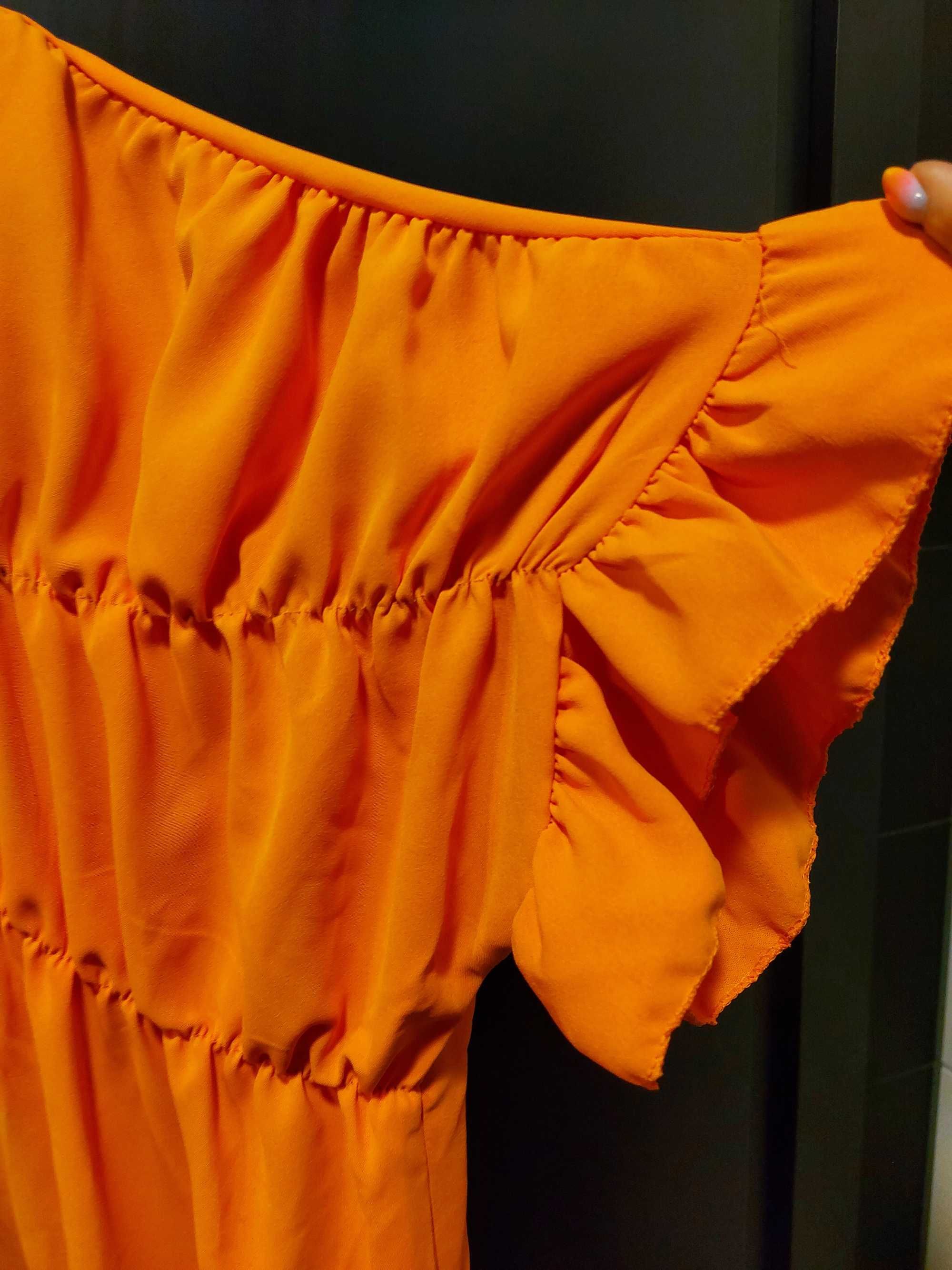 Bluzeczka w kolorze pomarańczu teraz bardzo modna rozmiar  uni