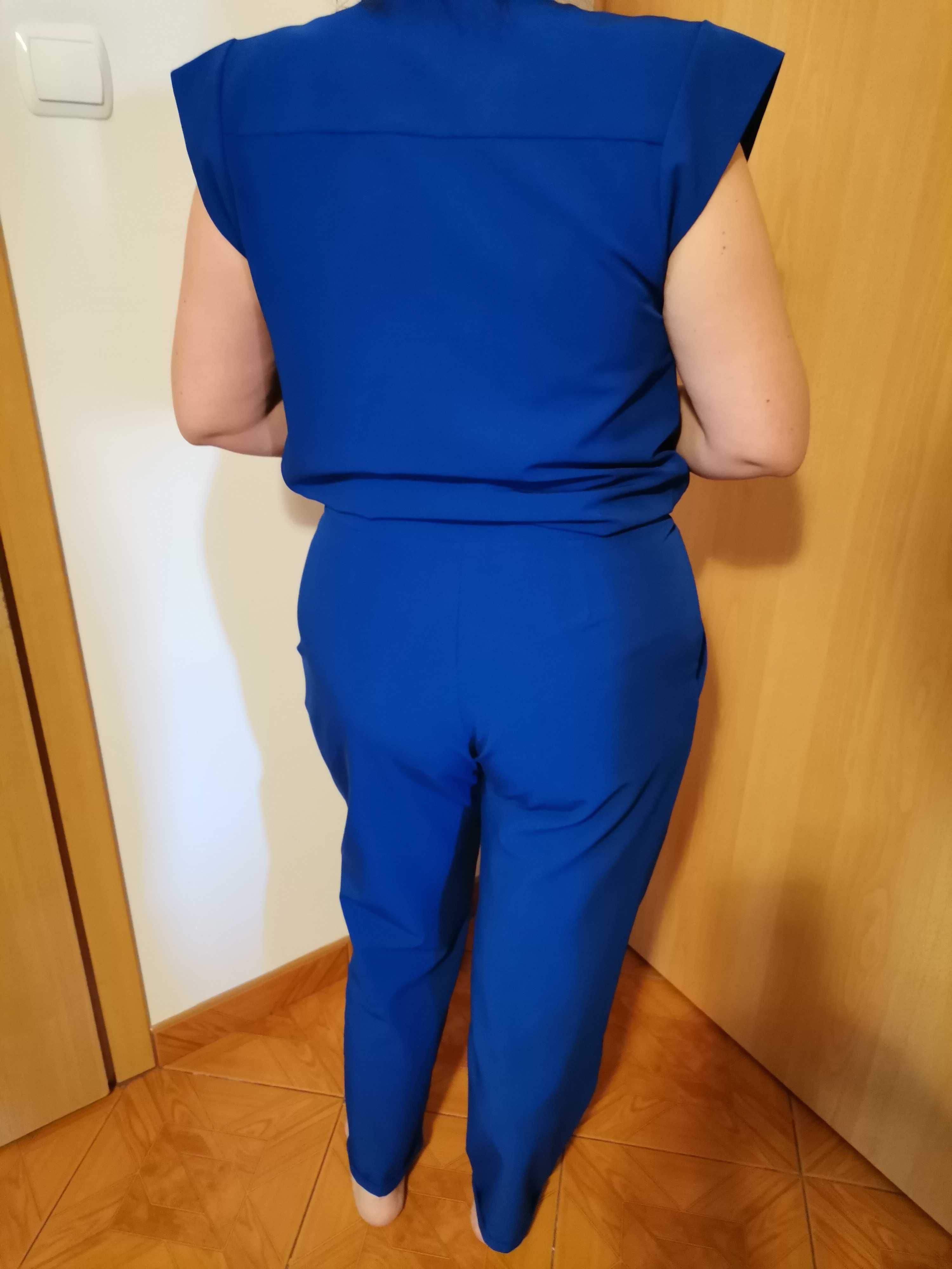 Kombinezon bez rękawów chaber niebieski r 42 XL MOE elegancki wesele