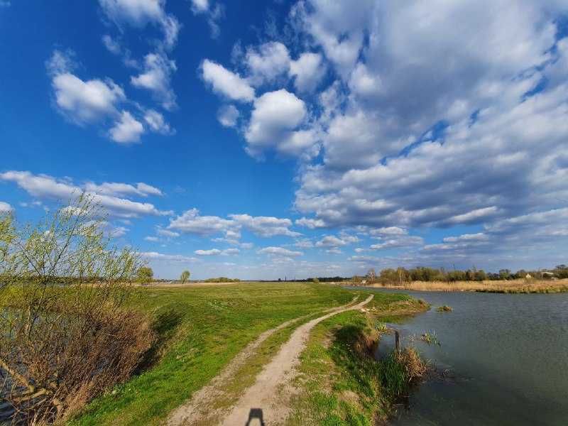 Продаж землі на березі річки під комплекс відпочинку  100 км від Київа