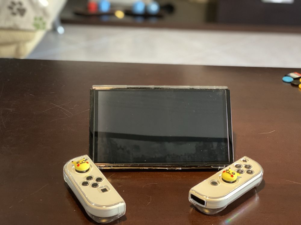 Nitendo switch oled+três jogos+acessorios ,na garantia