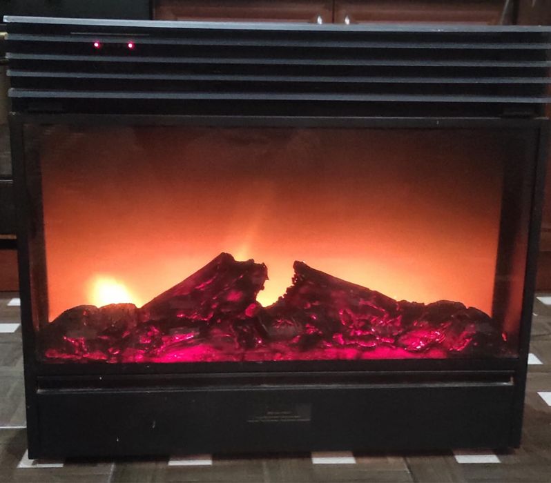 Електро камін який надасть тепло та затишок