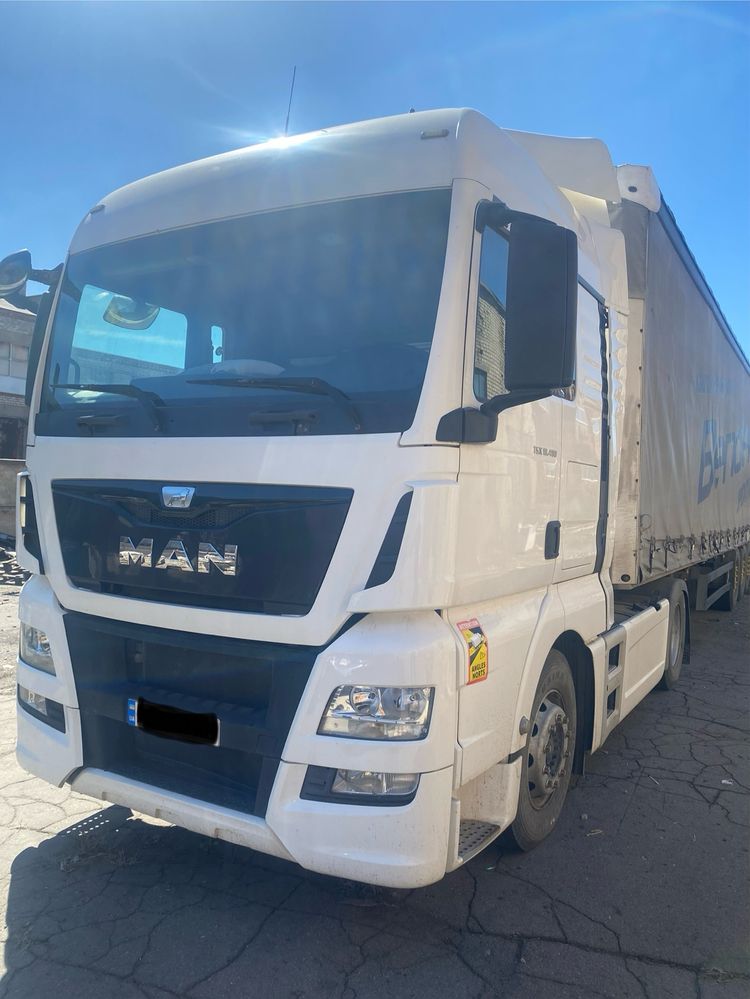 MAN TGX 18.480 та Schmitz