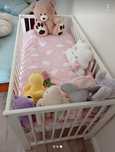 Cama de bebê com colchão