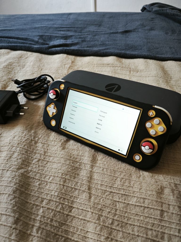 Switch Lite Amarela c/ Bolsa e Capa