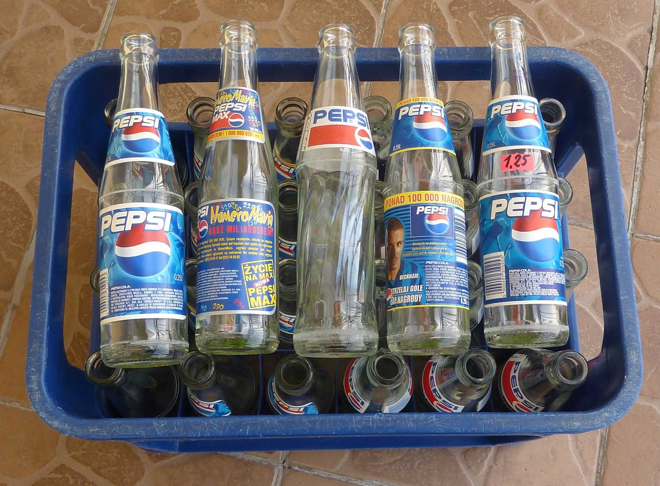 kontener z 1995 r. i 31 butelek 0,25 l - PEPSI-COLA - różne etykiety