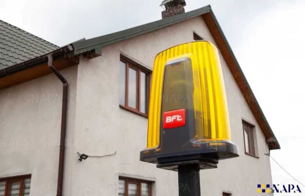 Автоматика BFT Італія для гаражних секційних відкатних розпашних воріт