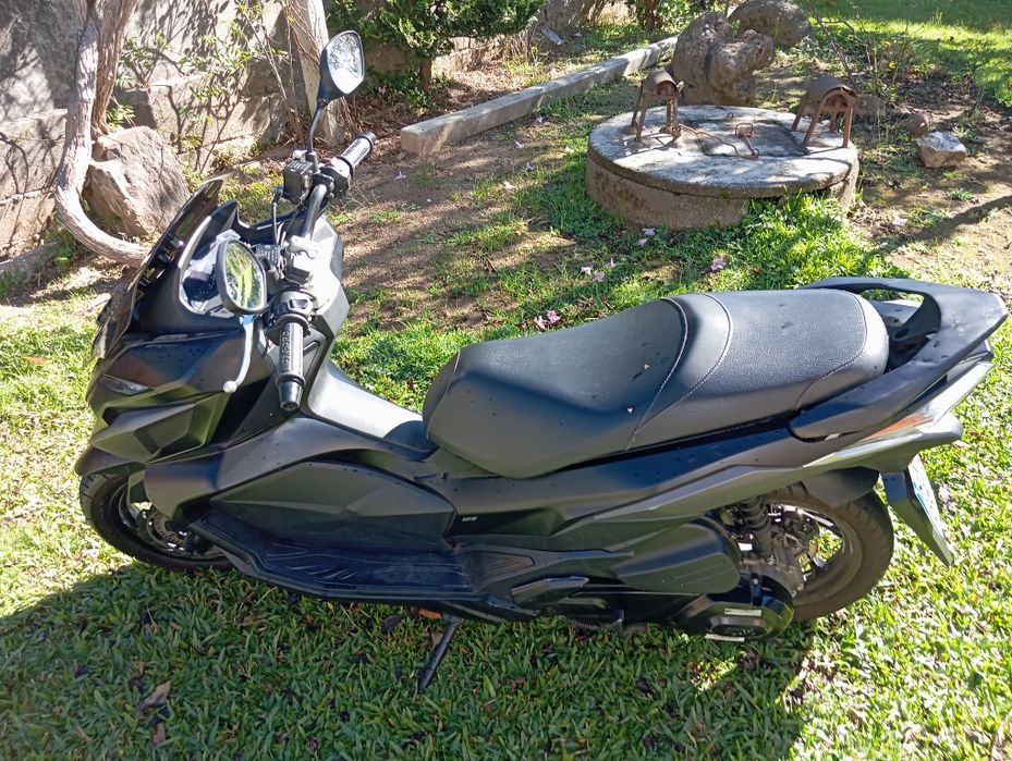 Sym jet x 125. Aquecimento a punhos