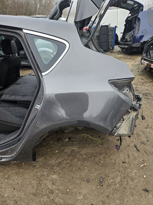 Opel Astra J blotnik tył prawy lewy ćwiartka poszycie  wanna pas