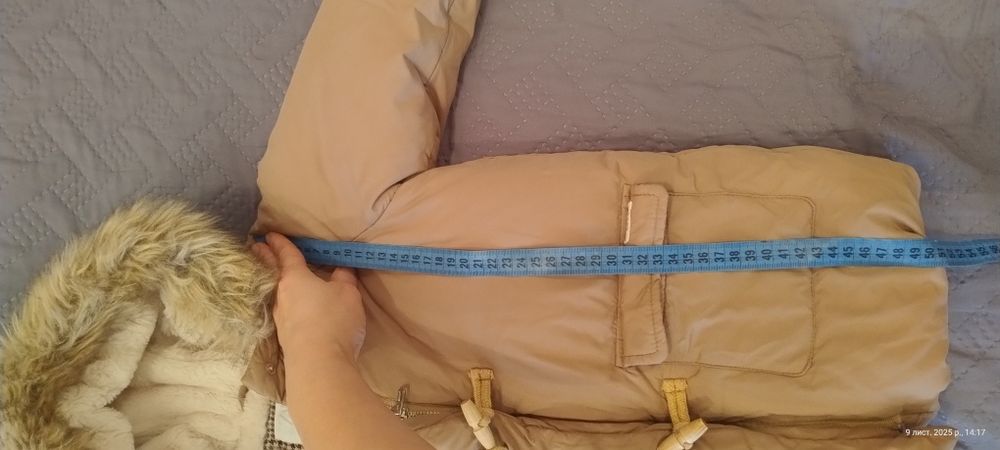 Дитячий пуховик.