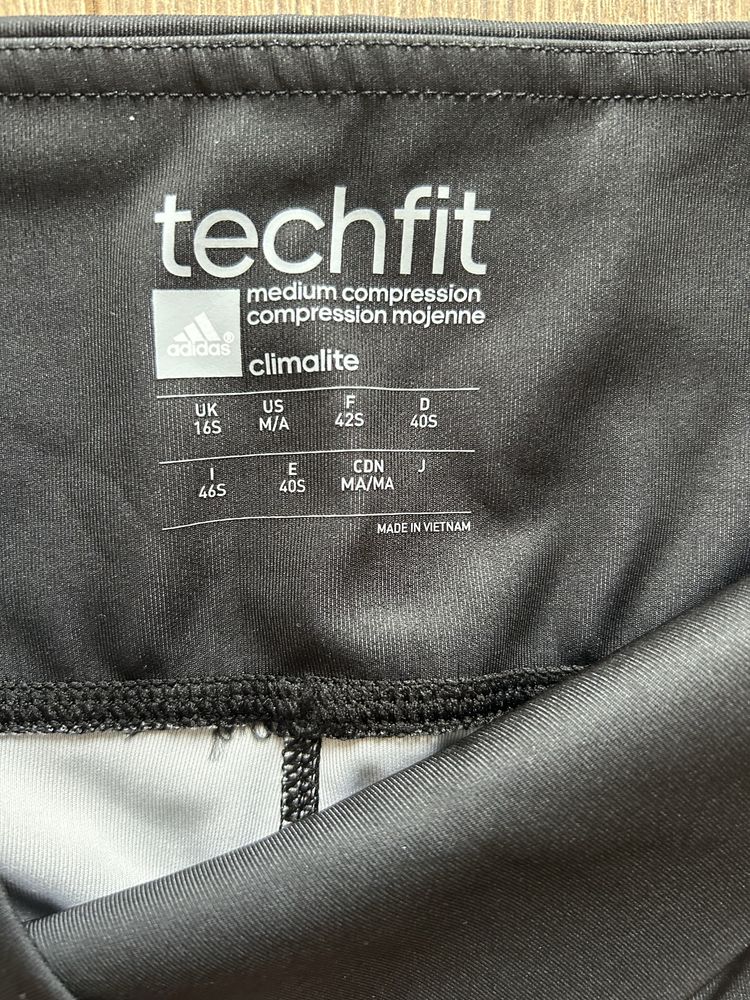 Nowe spodnie legginsy Adidas techfit rozmiar 40