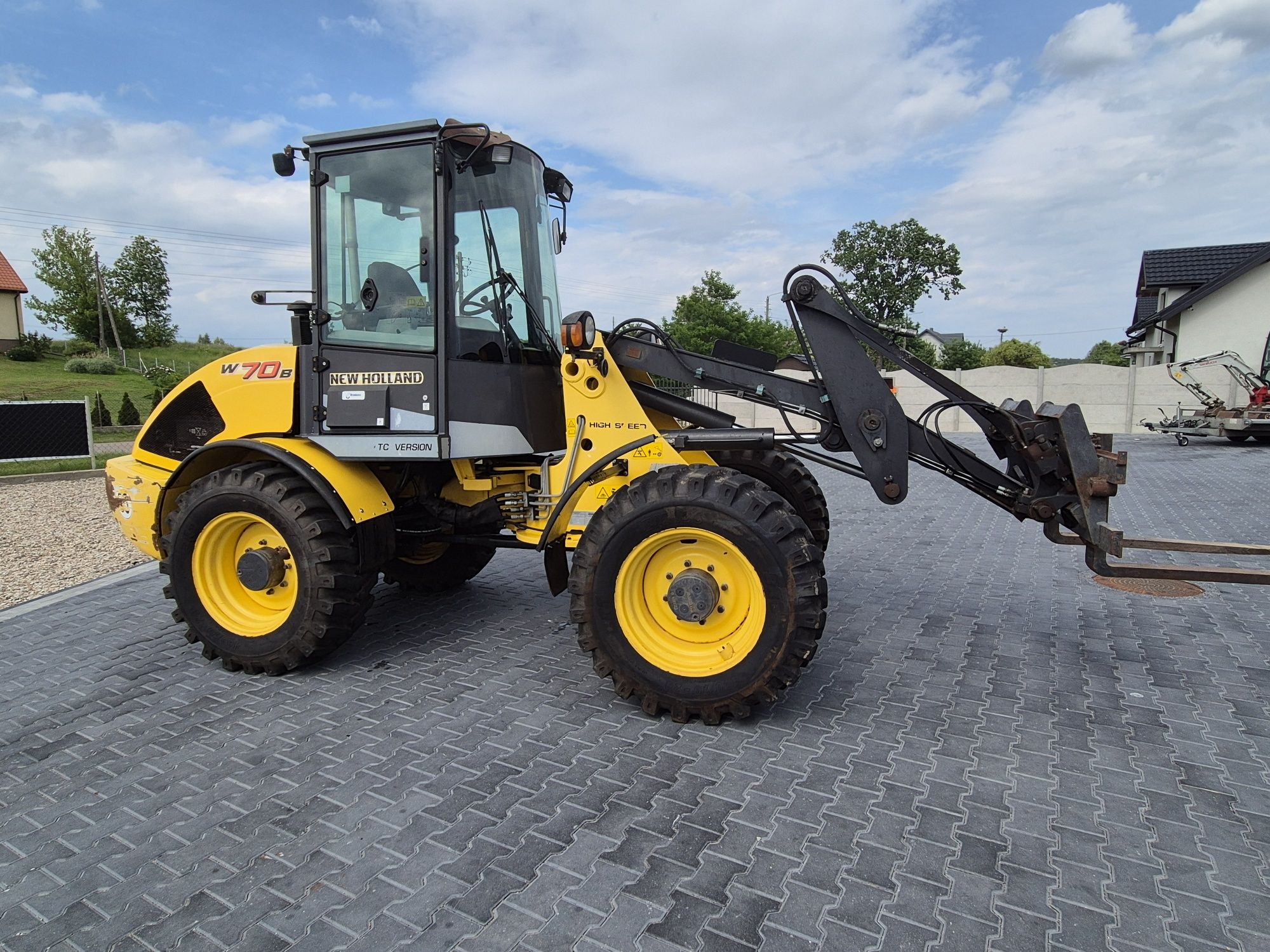 Ładowarka New holland W70B TC 2014r   Jcb atlas terex