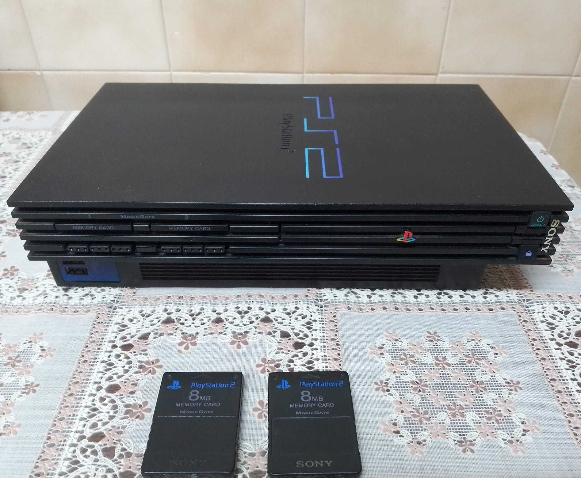 Consola PlayStation2 com 2 comandos, 2 Memory Card e 19 jogos