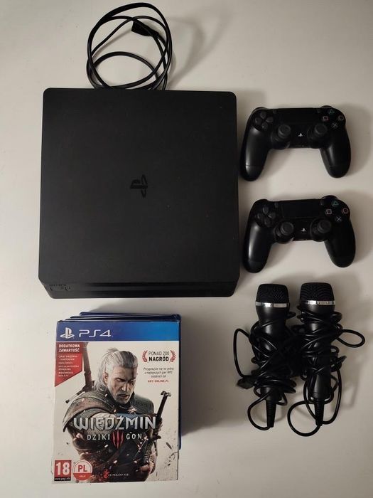 PlayStation 4 slim + 2 pady + 7 gier + 2 mikrofony