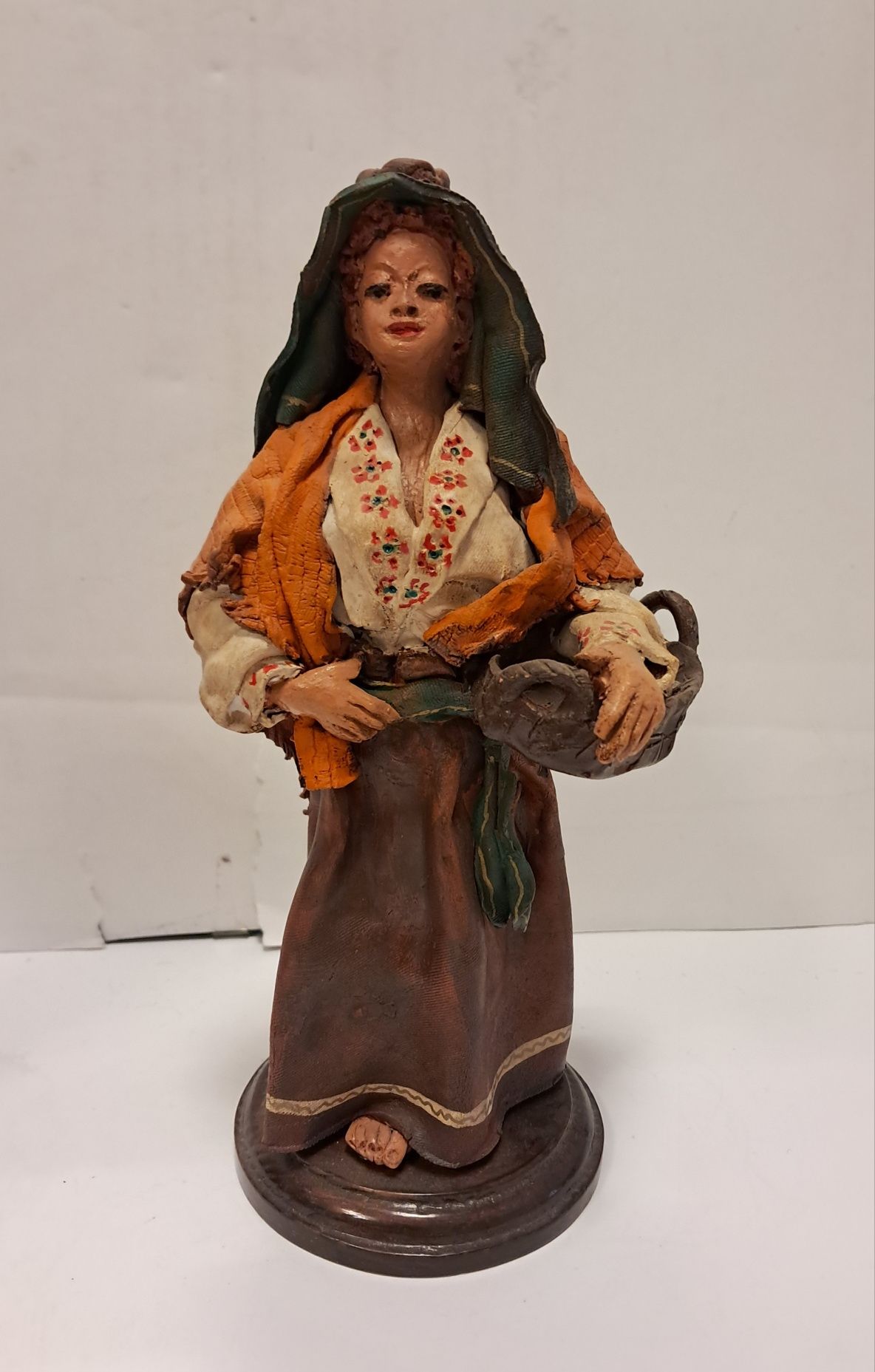 Par de figuras em barro