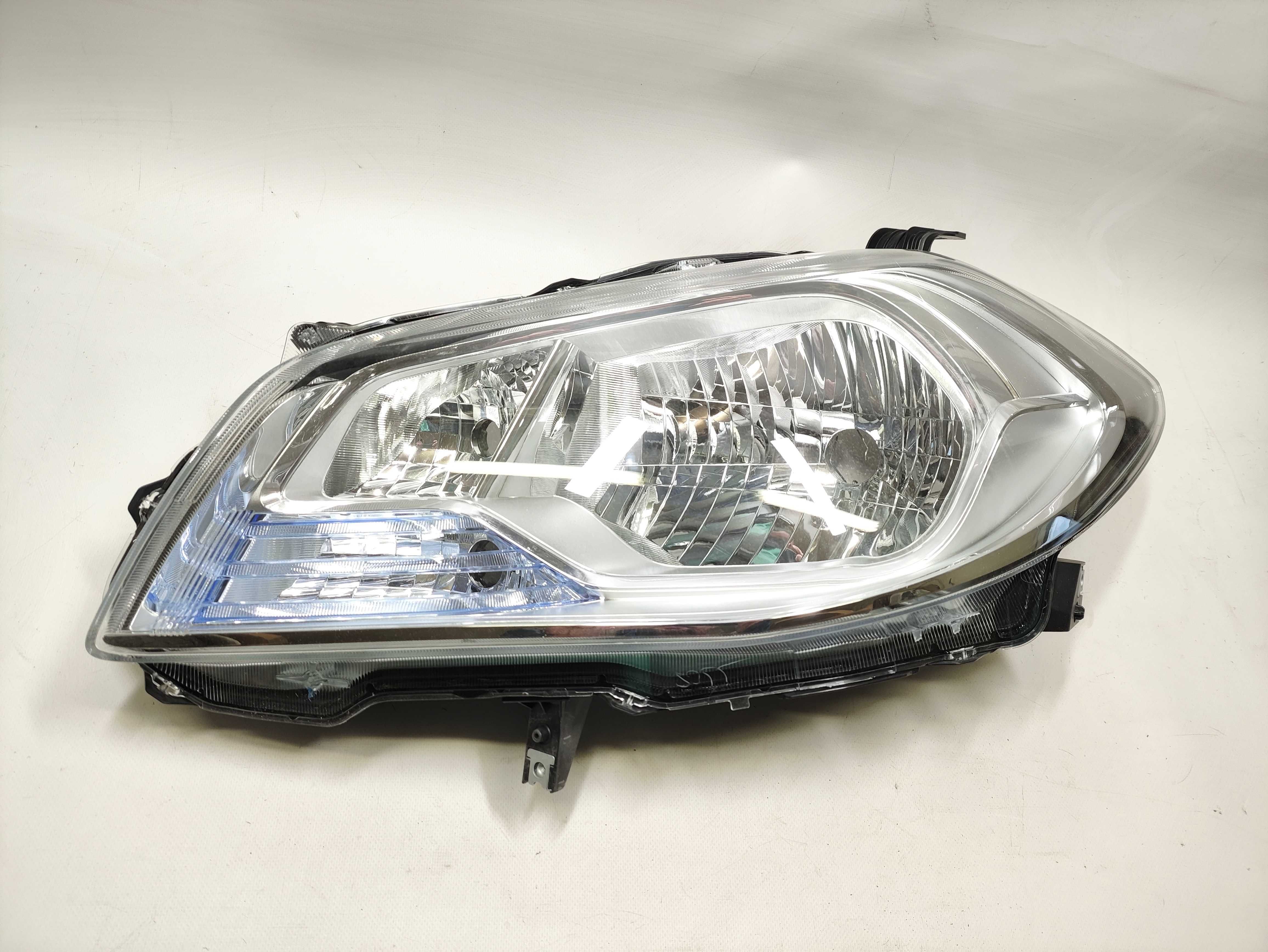 Lampa lewa przód lewy Suzuki SX-4 S-cross lift 13- oryginał NOWA