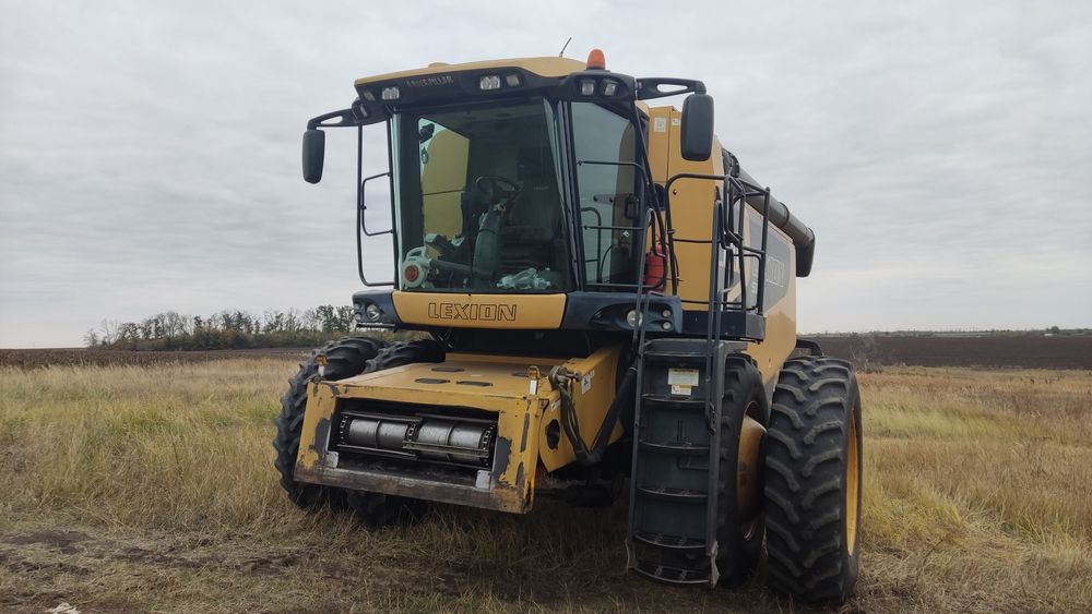 Комбайн Lexion 570 комплект 2 жниварки і візок