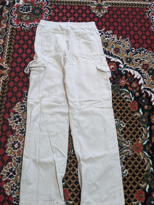 Штани  кольору типу ,пряжене молоко