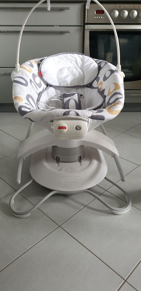 Заколисуючий центр, крісло гойдалка для немовлят, укачивающий центр.