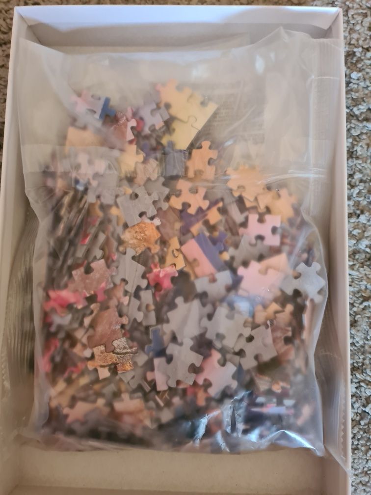 4  puzzles de 500, 1000 e 1500 peças