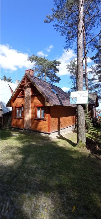 Domek w lesie nad jeziorem na Sylwestra