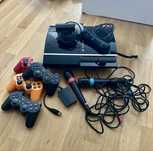 Playstation 3 + PS Move.