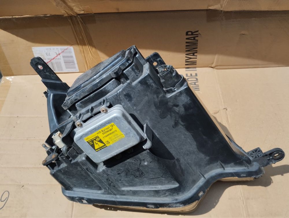 Lampa przednia lewa opel Antara xenon