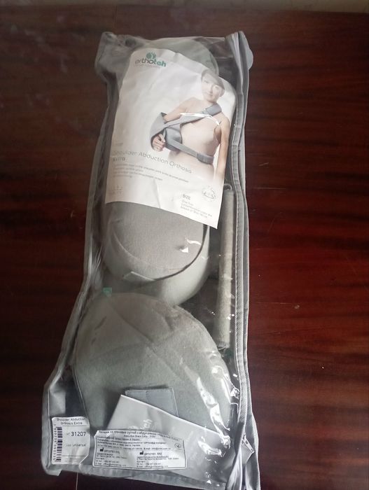 Фіксуюча пов'язка для відведення плеча