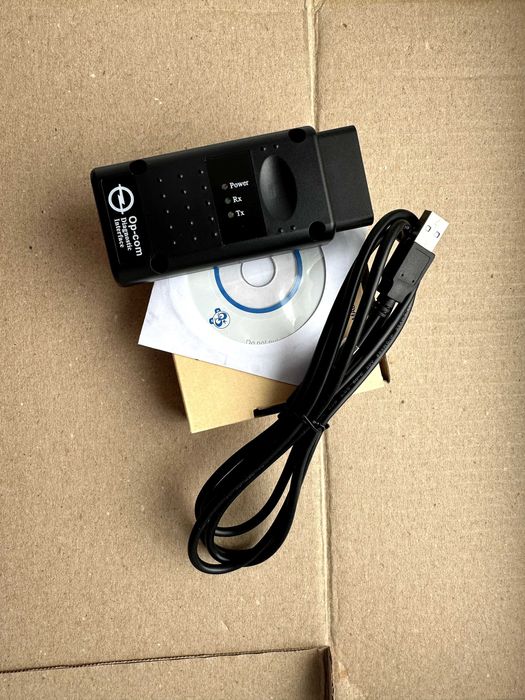 Автосканер для Опеля оп ком 1.99 работает с машинами с 92 года