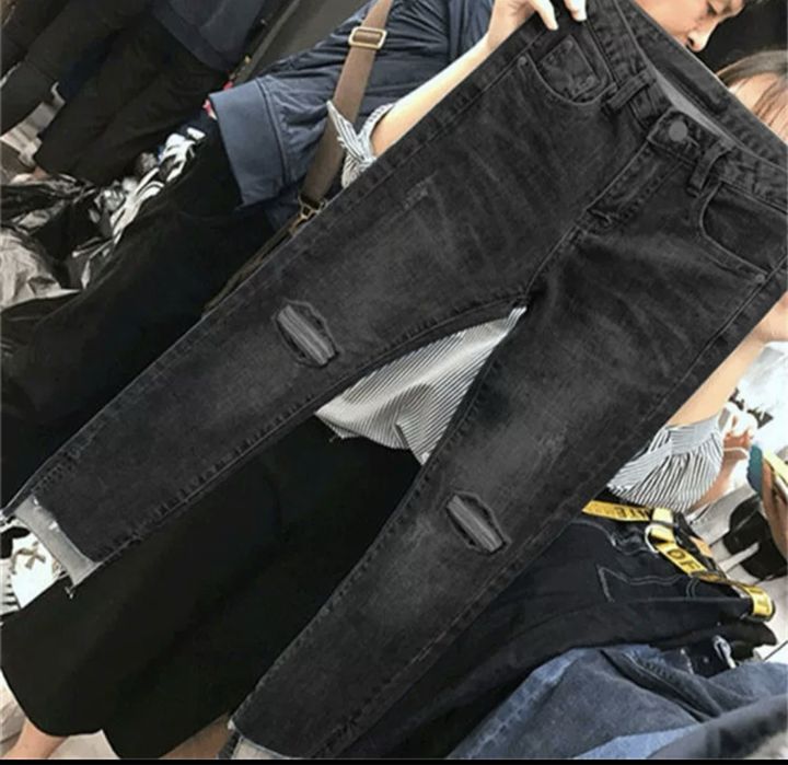 Рвані нові джинси