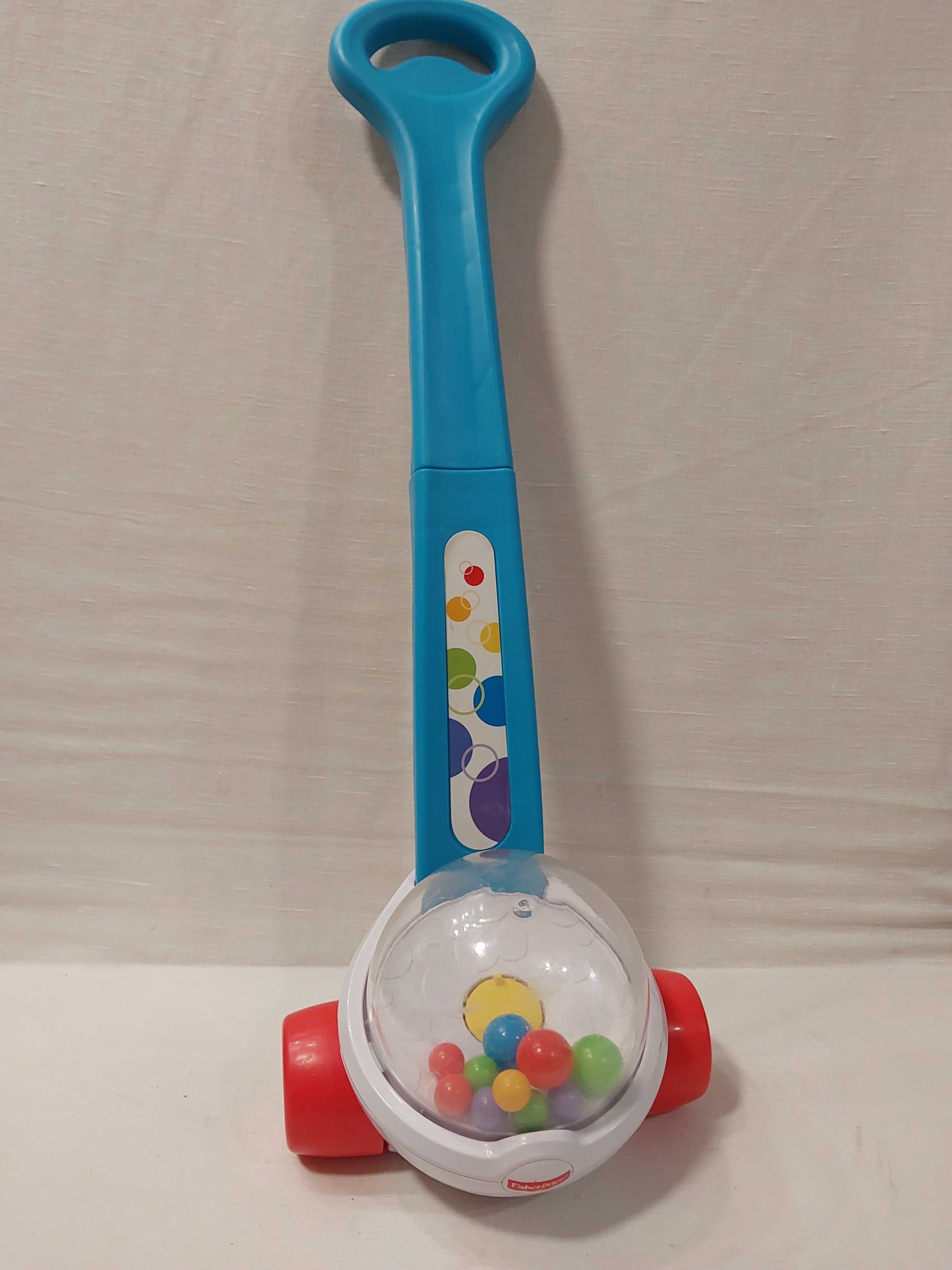Fisher Price_Pchacz/ jeździk z podskakującymi kulkami