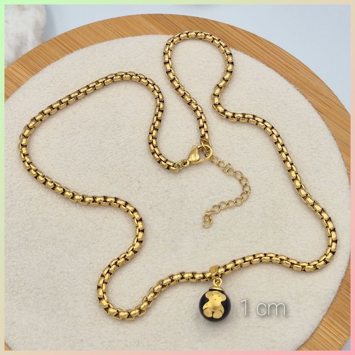 Naszyjnik miś złoty na perełce czarnej 1 cm łańcuszek stal chirurgiczn