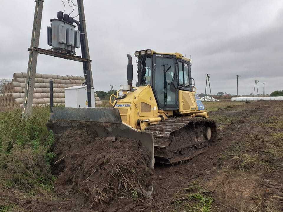 Wynajem/ usługi spycharką KOMATSU. Niwelacje terenu, odhumusowywanie.