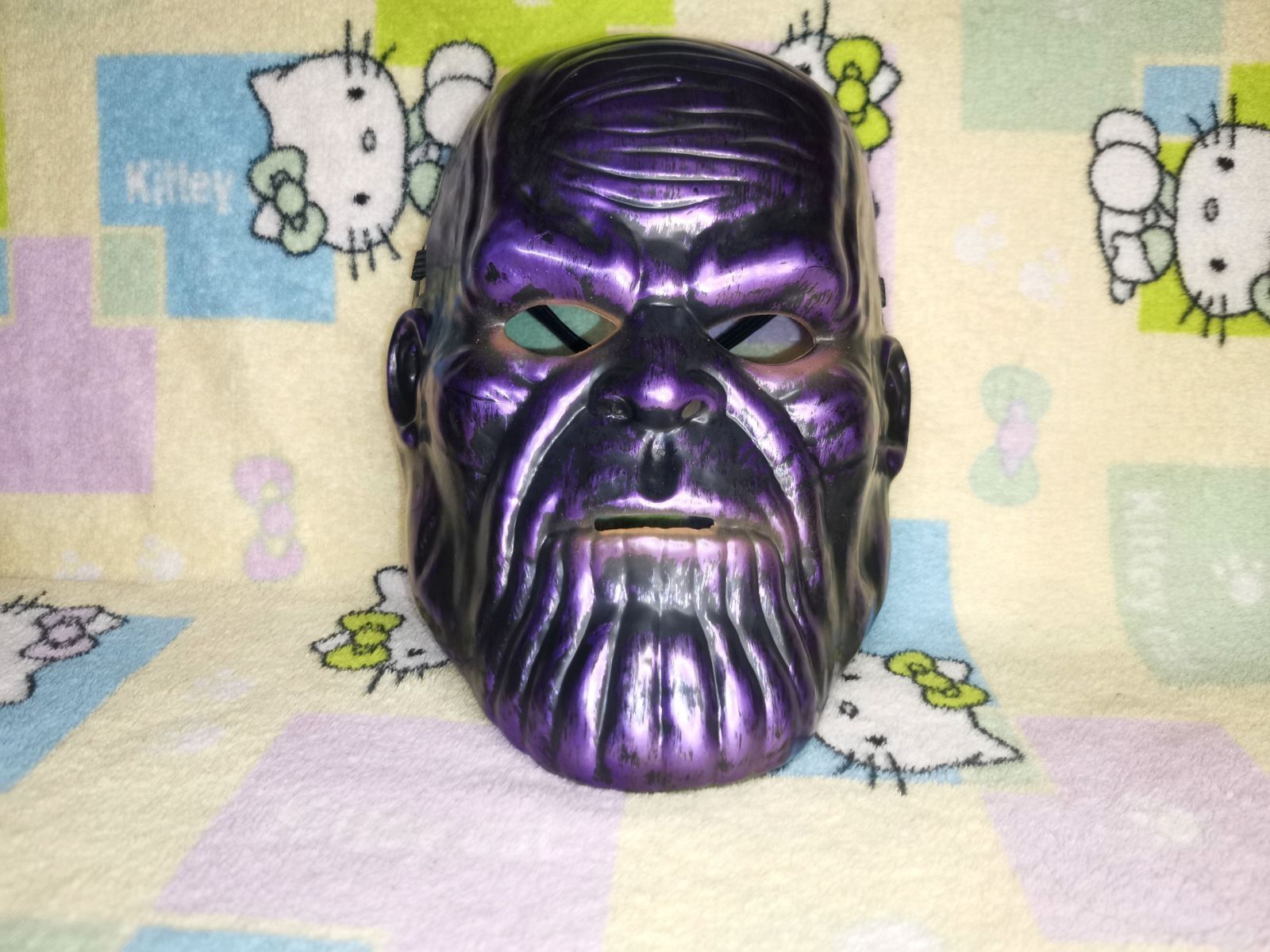 Танос Thanos злой персонаж вселенной комиксов Marvel Безумный титан