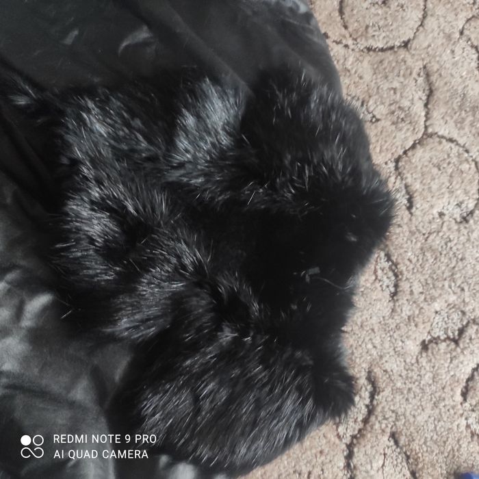 Чорне стильне пальто з натуральної шкіри