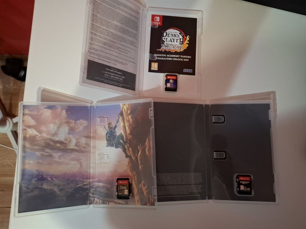 Nintendo Switch OLED + 3 gry + etui