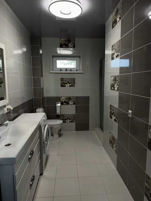 просторий будинок 228 м² з цокольним поверхом та  ділянкою 23 сотки