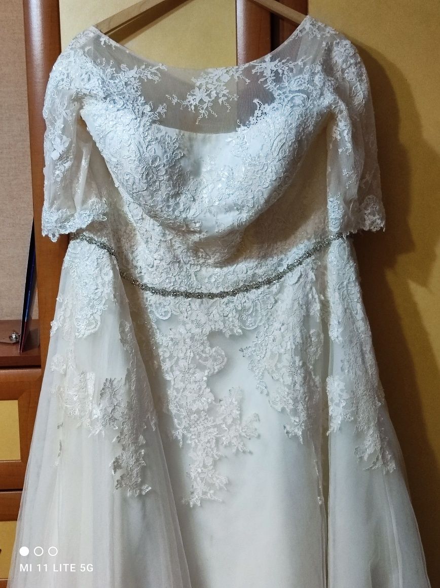 Suknia ślubna. Kolor ecru plus size