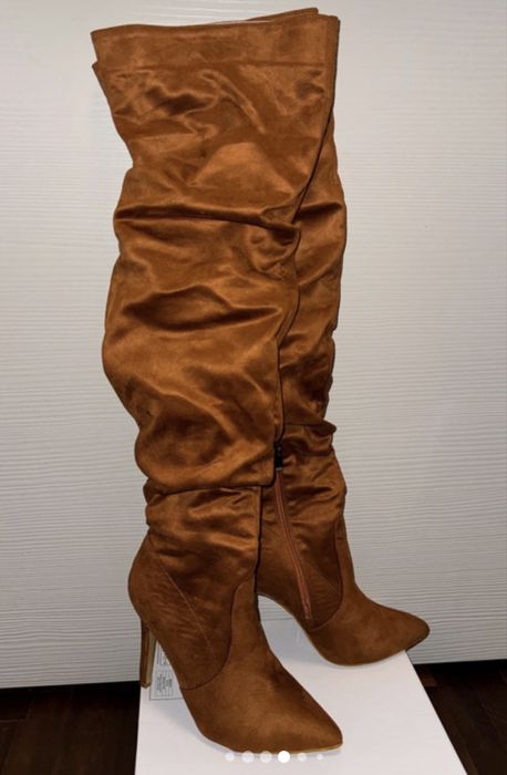 Botas cano alto enrugado