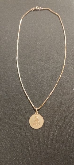 Złoty łańcuszek ankiet z zawieszką