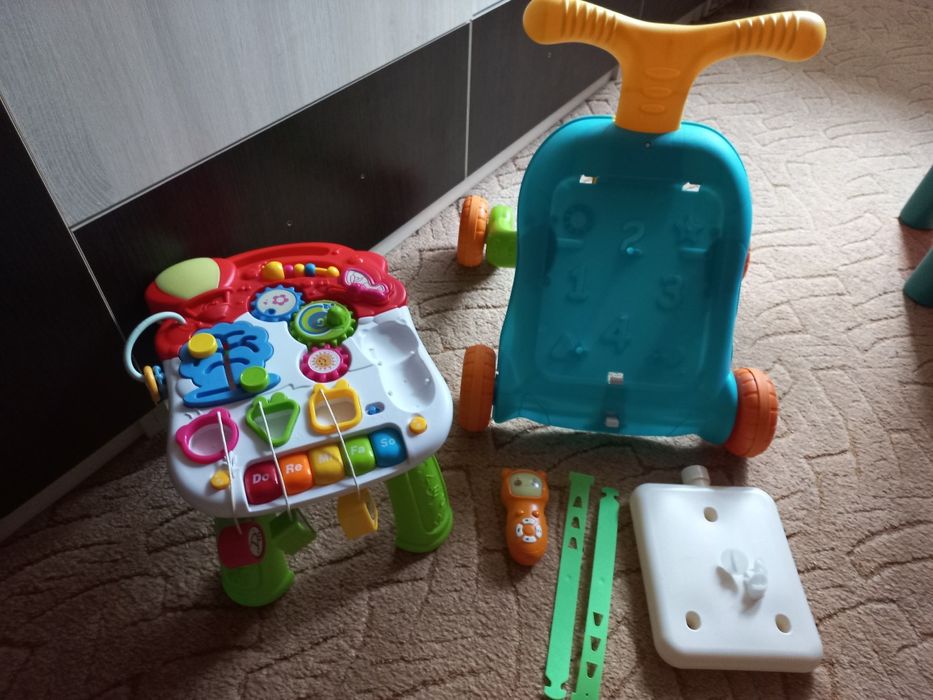 Дитячі ходунки-каталка, ігровий центр-столик Перші кроки 2в1