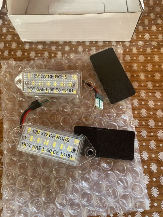 інші мото запчастини підсвітка номера Mitsubishi Lancer мото