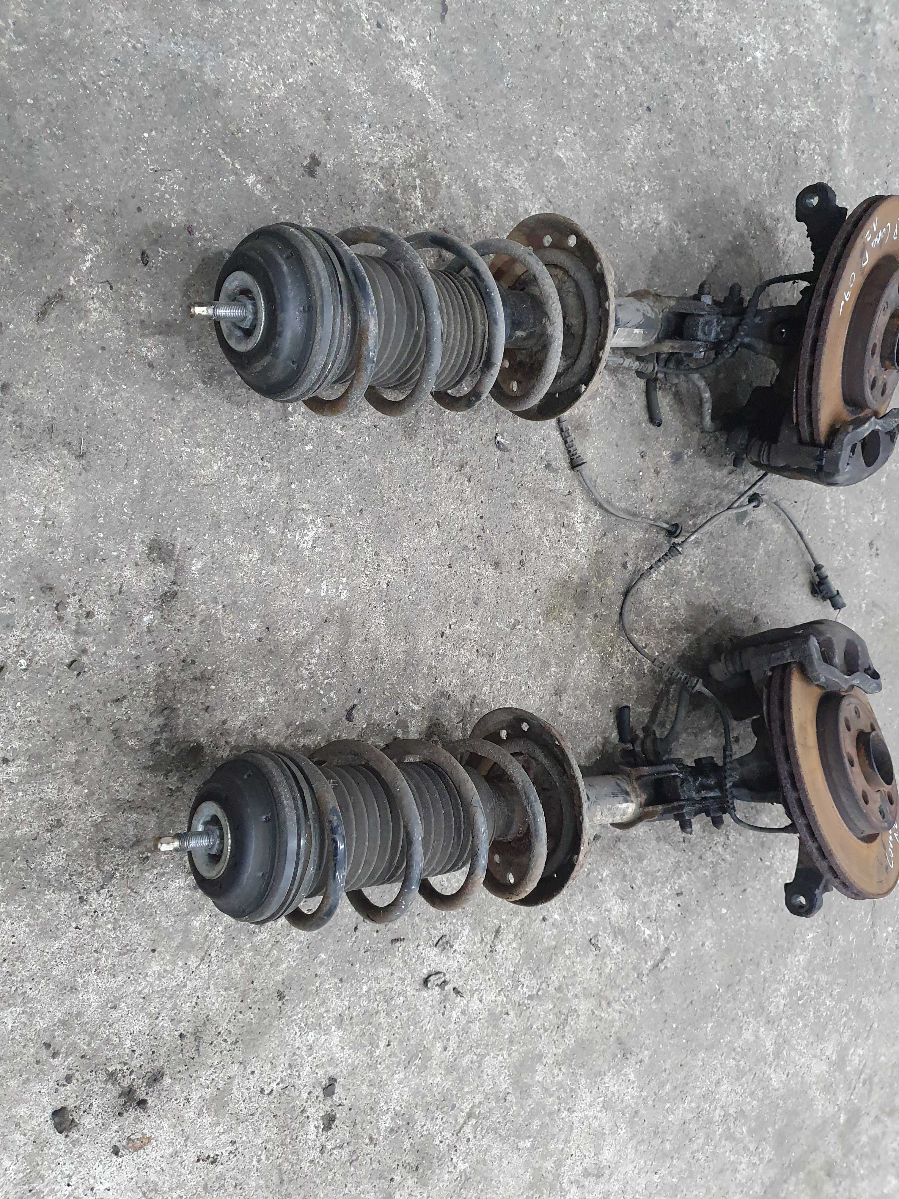 Amortyzator piasta zwrotnica zacisk sprezyna Opel Corsa D 1.2