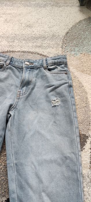 Jeansy niebieskie 134